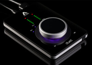 apogee duet 3 audio interface on black background